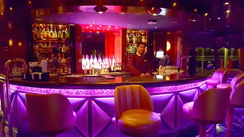 The atmospheric Hemispheres lounge aboard Queen Victoria.