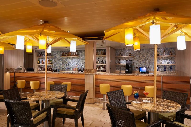 The Ocean Plaza Bar features live music and dancing every night on Carnival Horizon.