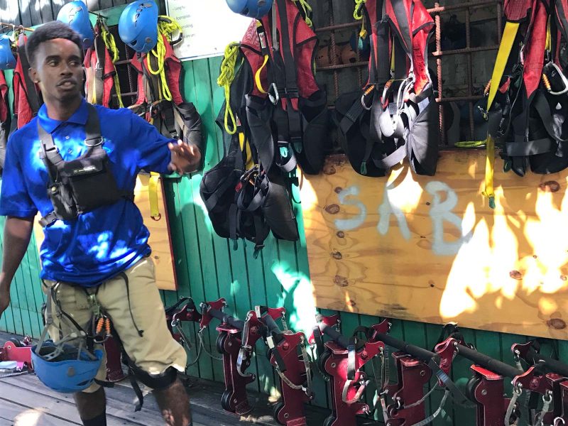 Getting outfitted for a zipline tour in St. Kitts.