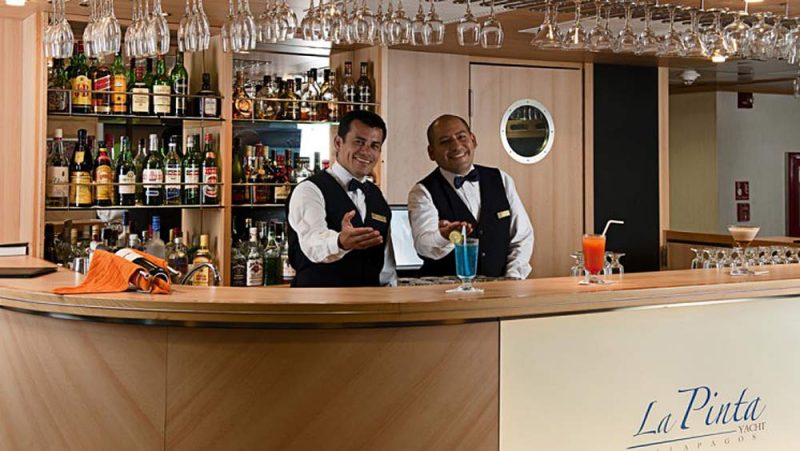 Relax at the bar and chat up the bartneder while enjoying spectacular views of the Galapagos on La Pinta.