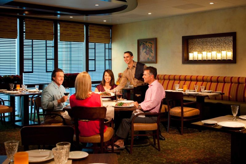 Dine in a casual, comfortable setting at Giovanni's Table, an Italian restaurant that serves family-style dishes at lunch ($15) and dinner ($20) on Grandeur of the Seas.
