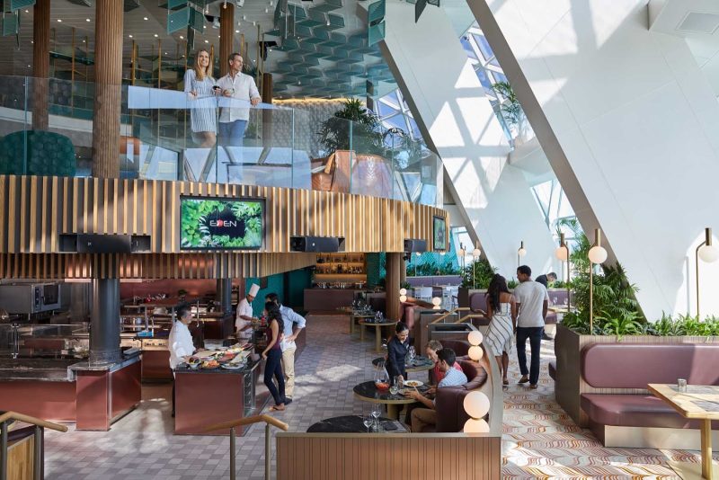 The kitchen area of the sprawling three-deck Eden lounge on Celebrity Edge class ships.