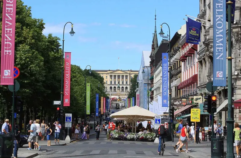Stroll through Karl Johans Gate, a popular pedestrian thoroughfare in Oslo, Norway.
