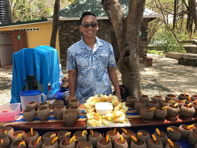 Ruel, a Wind Surf deck hand serving refreshments on Pigeon Island.
