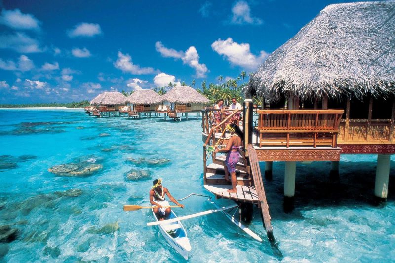 A staffer greets guests at an overwater bungalow at the Manihi Pearl Beach Resort in the Manihi atoll. Manihi is the original home to the first pearl farmers in French Polynesia, and it offers some of the best dive sites in the world.