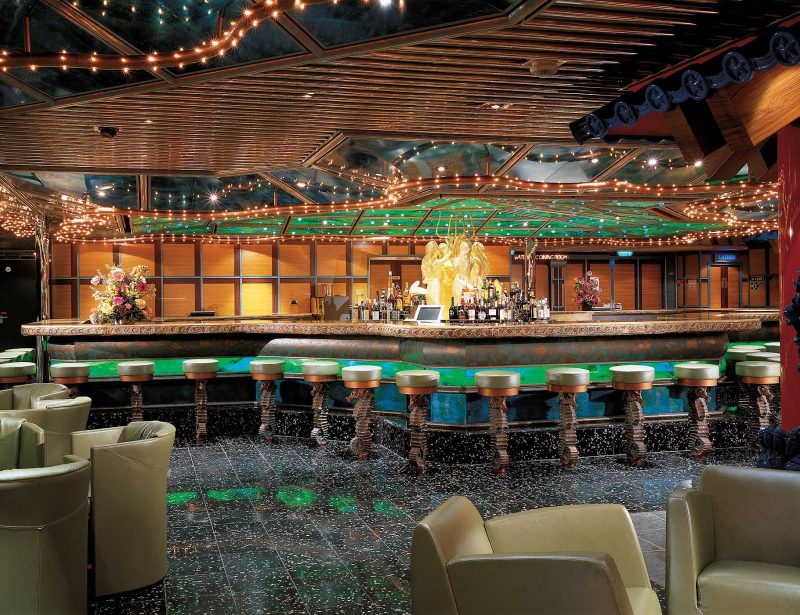 Take in a live performance at the Trident Bar, in Carnival Victory's casino.