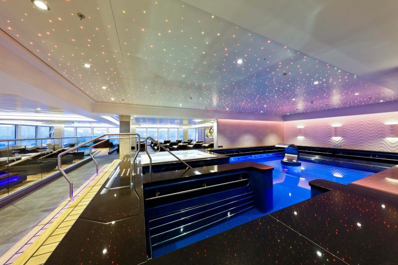 Unwind in the largest thermal spa at sea with a steam or a dip in the Vitality Pool aboard Norwegian Escape.