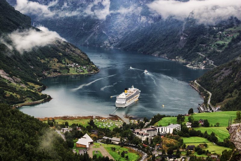 Costa Magica alights in Geiranger village at the head of the Geirangerfjord, which is a branch of the Storfjord in Norway.