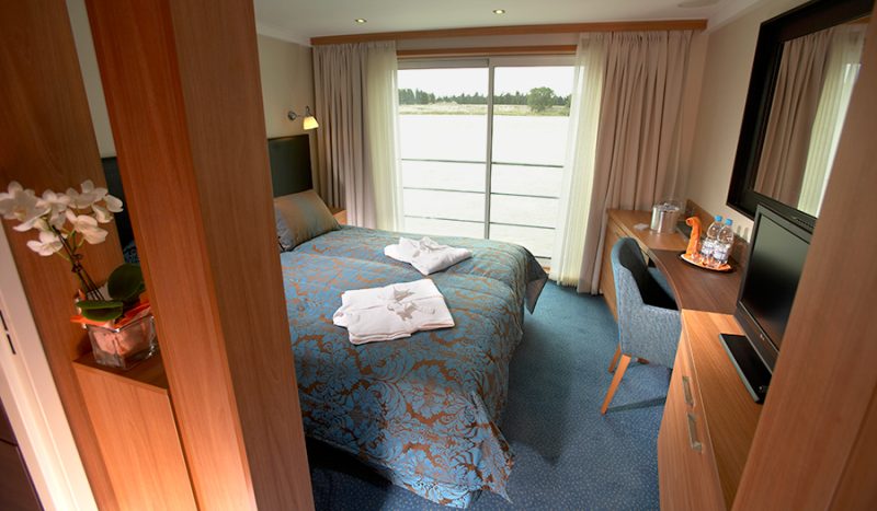 Wake up to a beautiful view of France gliding by your deluxe stateroom on Avalon Scenery.