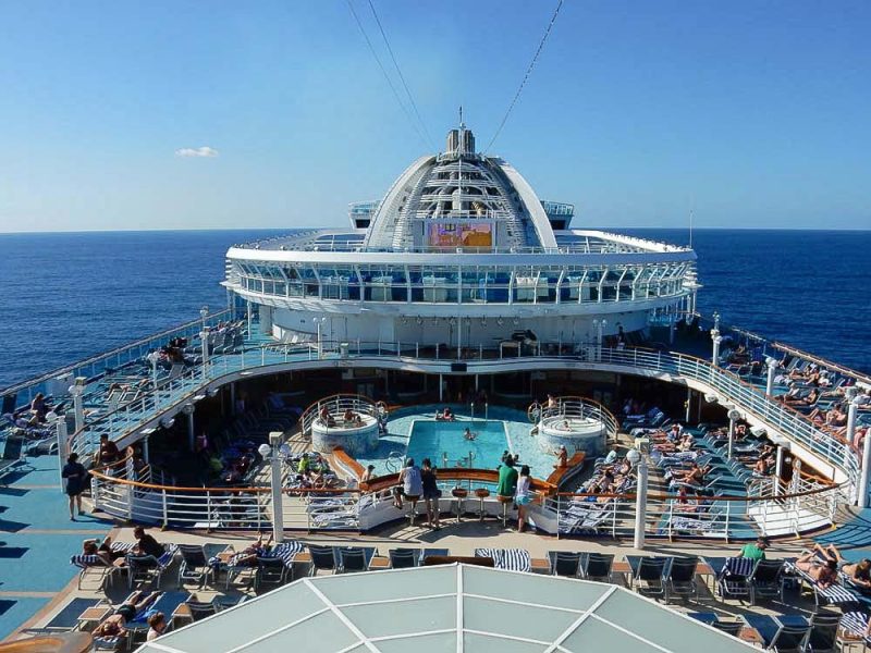 The Lido deck of Ruby Princess on a sunny day at sea.