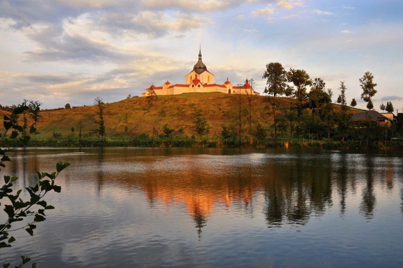 A view from the river of the 17th-century Pilgrimage Church of St. John of Nepomuk at Zelená Hora in the Czech Republic.
