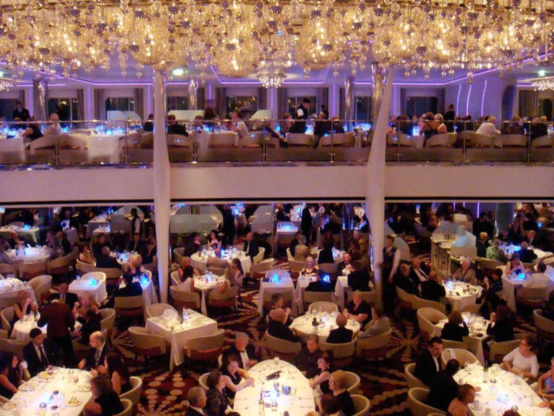 A side view of the main dining room on board Celebrity Equinox.