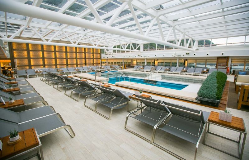 Head for a comfortable dip in the pool in the enclosed Wintergarden on a Viking ocean sailing.