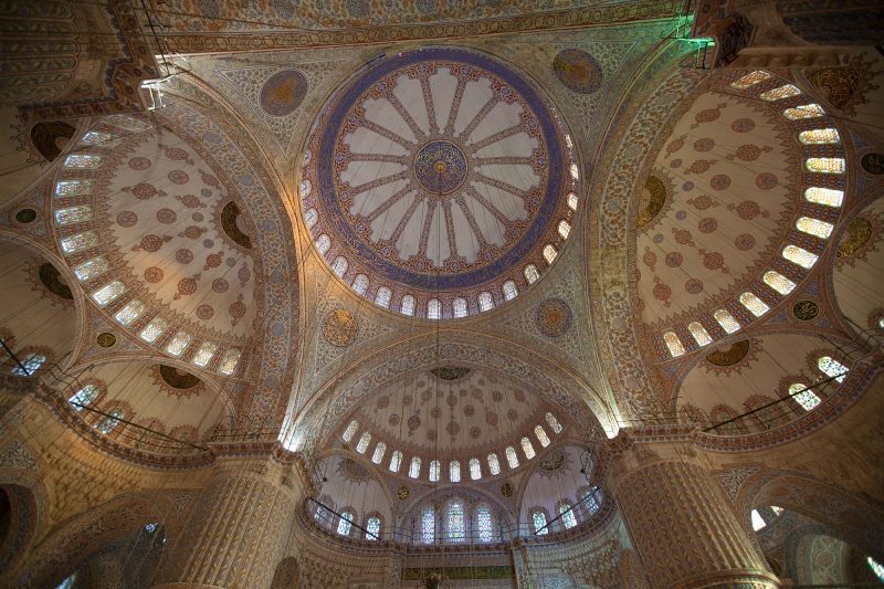 Interior of the ornate Sultan Ahmed Mosque, or Blue Mosque, in Istanbul, Turkey.