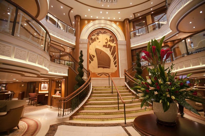 An elegant staircase leads to the Grand Lobby of Queen Elizabeth.