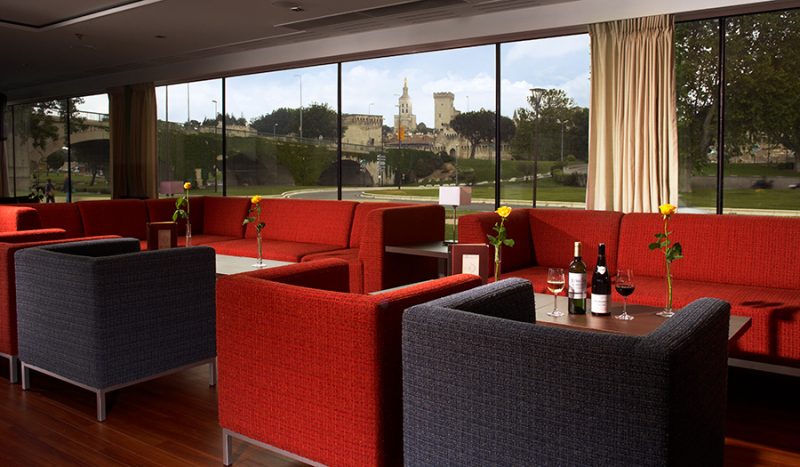 Savor one of the regional wines and watch France sail by from Avalon Scenery's Panorama Lounge.