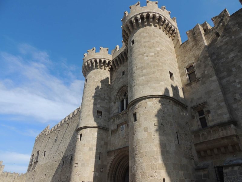 A castle looms over visitors to Rhodes, Greece. 