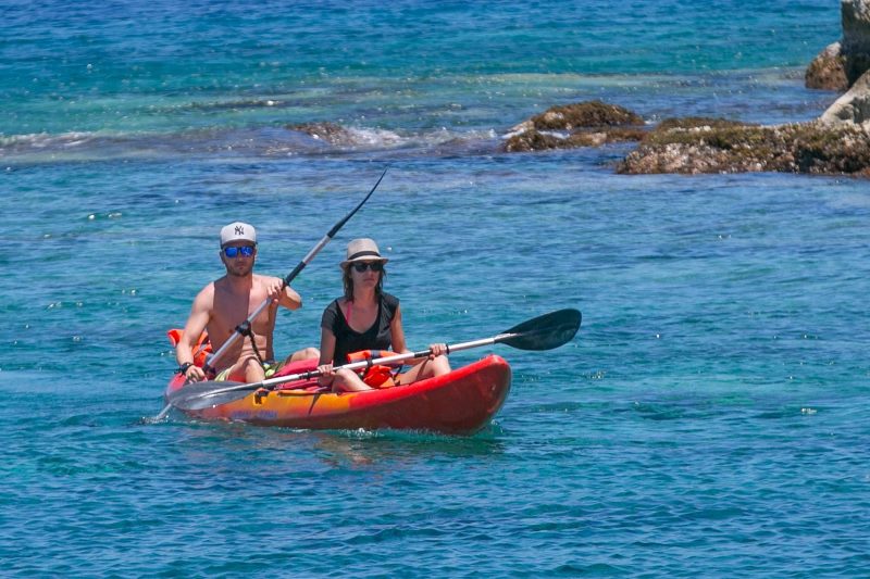 A French couple kayaks in Îles des Saintes, Guadeloupe, in the Caribbean.