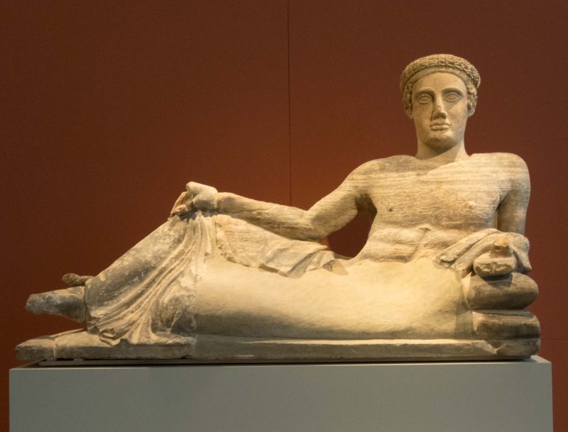 Cinerary Urn: Reclining young man dates to 440-460 B.C. in the Altes Museum in Berlin.