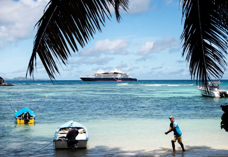 The Ponant ship Le Laperouse moored off the coast of the Seychelles.