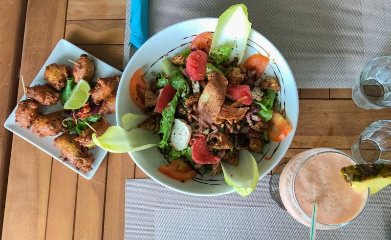 A Gourmonde salad and milkshake at Les Filets Bleus on the beach of Le Marin, Martinique.