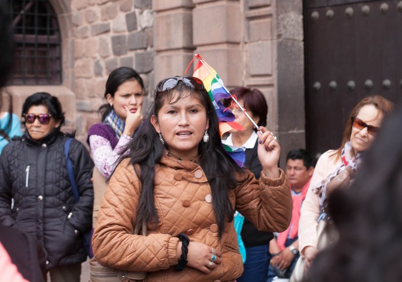 A Peruvian guide outside the Koricancha sacred complex in Cusco, Peru.
