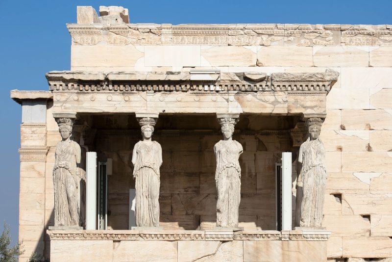 Statues line the Erechtheion, or Temple of Athena, built in 421-406 BC at the Acropolis in Athens.
