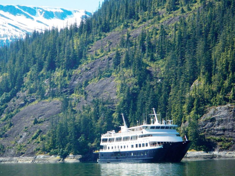 Safari Endeavour sails past a glacier in an Alaskan inlet.