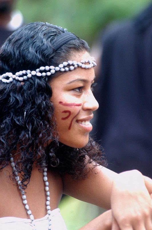 A girl dons traditional Carib markings in Dominica. The Carib people were the original inhabitants of most of the Lesser Antilles.