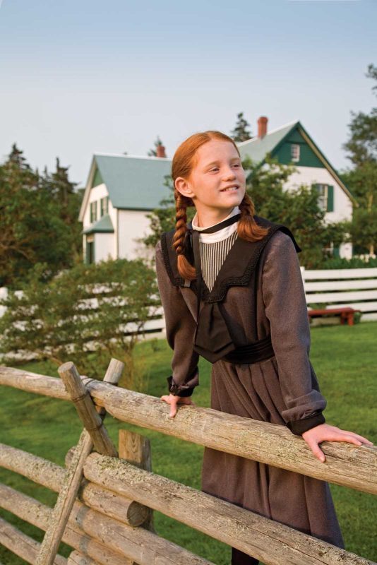 A young girl plays the role of Anne from the 1908 novel "Anne of Green Gables," set on Prince Edward Island.