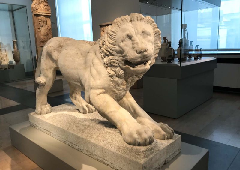 A funerary lion that served as a monument to a person of wealth in Greek society. The marble statue dates to 320 B.C. at the Altes Museum in Berlin.