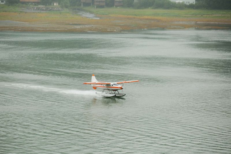 A float plane touches down in Auke Bay Harbor, Juneau, Alaska.