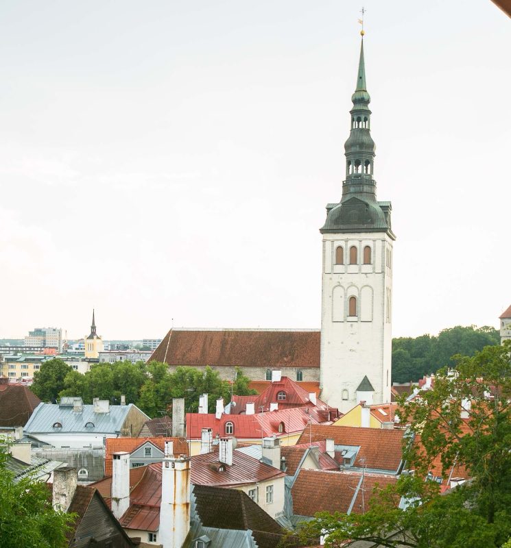 St. Nicholas Church rises over the cityscape of Tallinn, Estonia.
