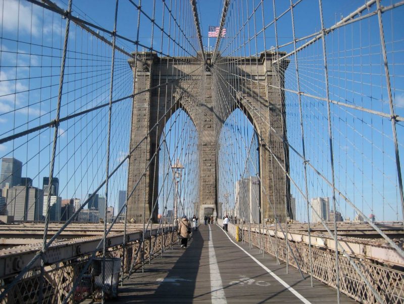 The Brooklyn Bridge connects the boroughs of Manhattan and Brooklyn by spanning the East River.