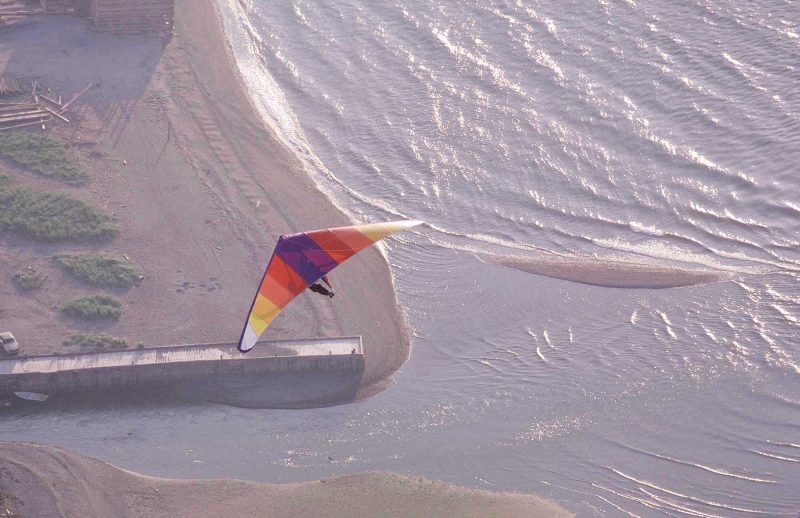 Hang gliding on the beach, Gaspesie, Quebec.