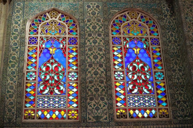 Elaborately patterned stained glass windows inside the Blue Mosque, or Sultan Ahmed Mosque.