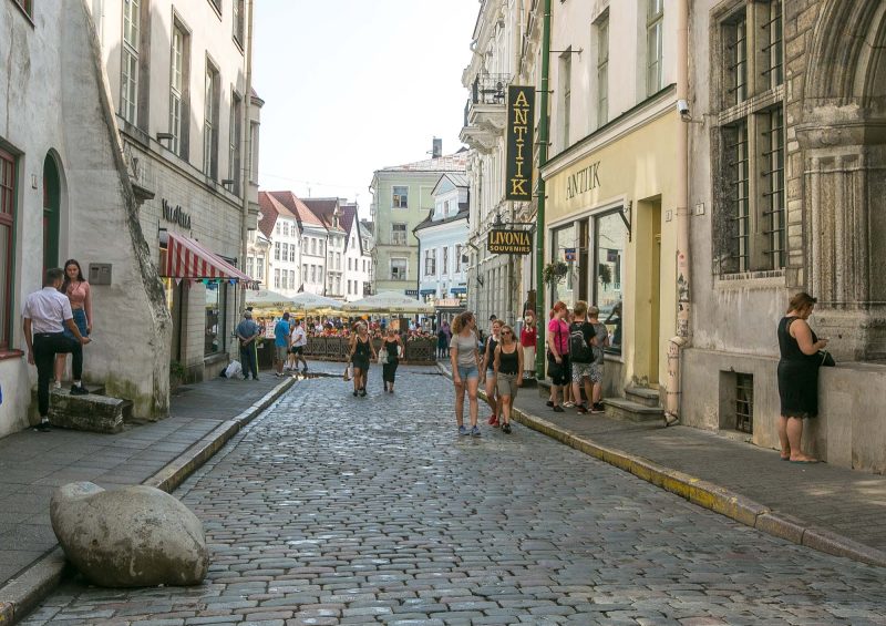 A cobblestone street in Old Tallinn after a rainstorm.