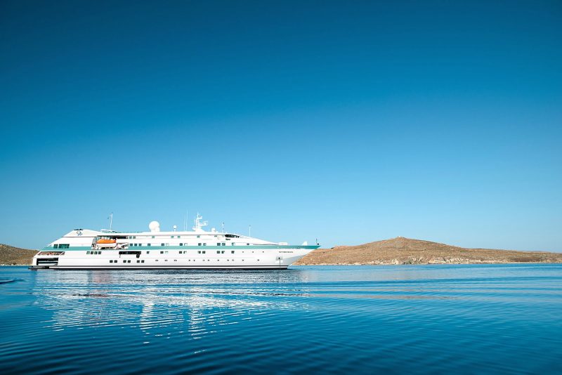 Paul Gauguin Cruises' Tere Moana anchored off the historic island of Delos, Greece.