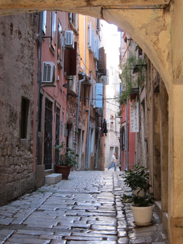 A cobblestone lane in the scenic seaport town of Rovinj, Croatia.