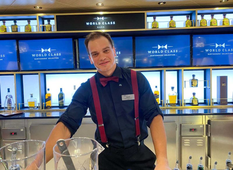 Celebrity Equinox master mixologist Daniil Razinkov prepares drinks at the World Class Bar.