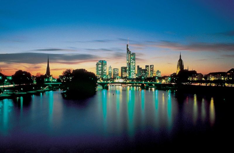 At night, the skyline of Frankfurt, Germany, is a beautiful blend of old and new.