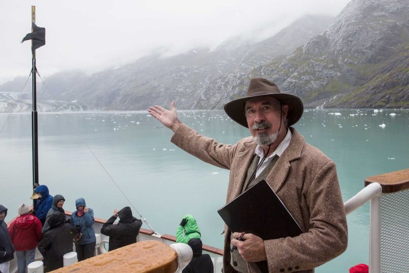 A guide, channeling conservationist John Muir, tells stories of the natural surroundings during a cruise on SS Legacy.