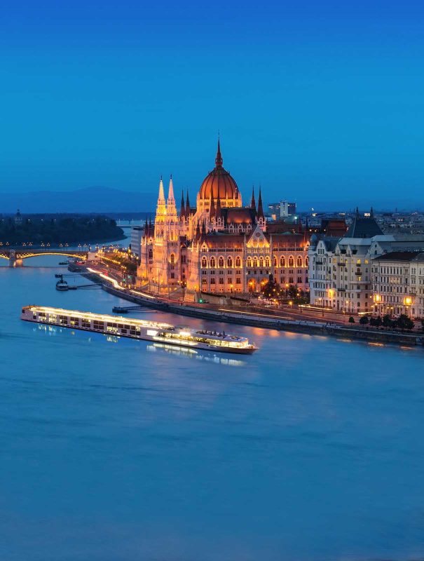 The luxury river ship Scenic Jasper sails through Budapest on the Danube. 
