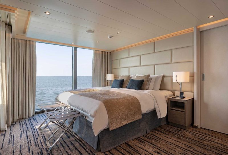 The bedroom of the Grand Suite aboard Silver Origin, Silversea’s ﬁrst ship built for the Galapagos. 