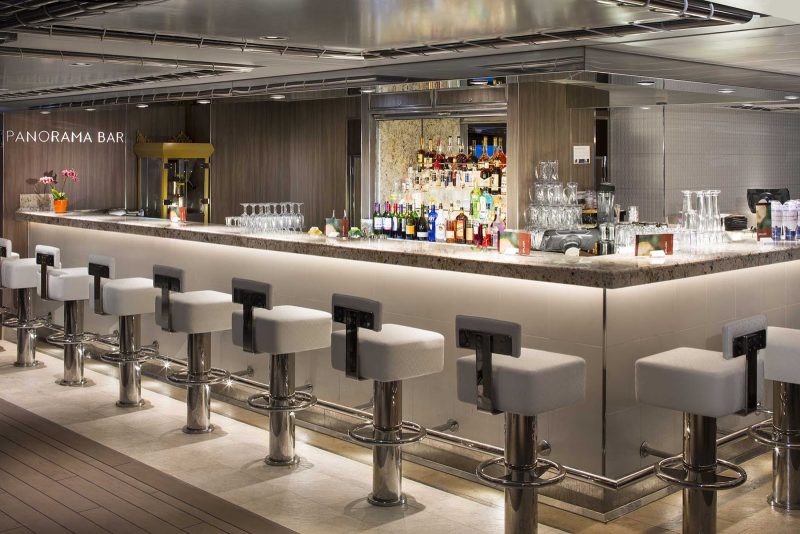 Relax and chat up some new friends at the Panorama Bar on ms Koningsdam.