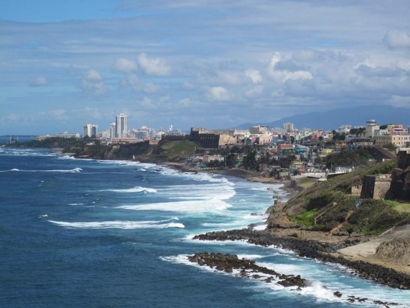 The beautiful coastline of San Juan as a cruise ship approaches Castillo de San Cristobal.