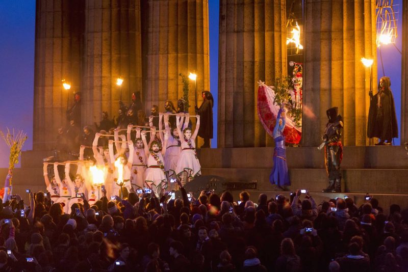Smartphones come out to record the Beltane Fire Festival in Edinburgh, Scotland.