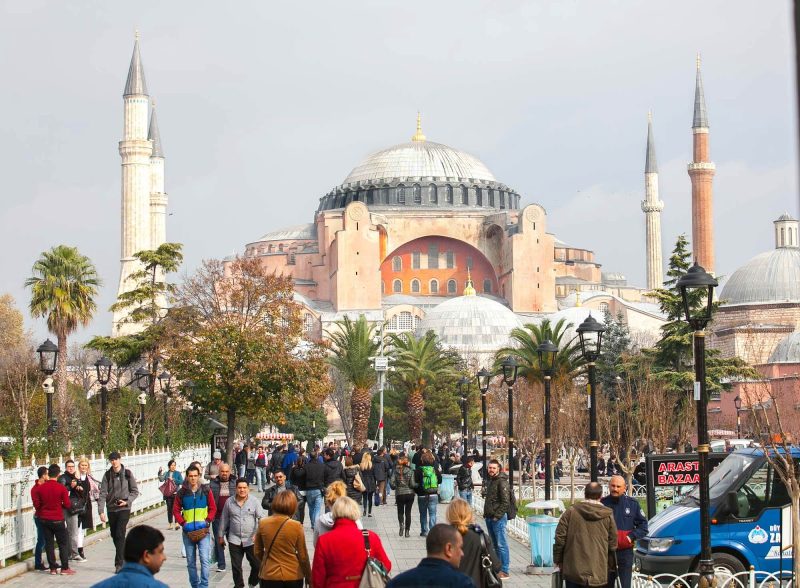 Visitors move between Hagia Sophia and the Blue Mosque in Istanbul, Turkey.