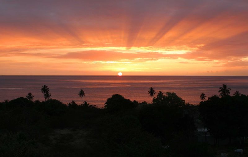 A perfect sunset on the tropical island of Nevis in the Caribbean.